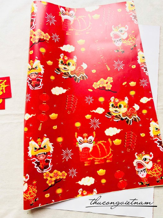 Giấy gói quà Tết 50x70cm – Họa tiết Con Lân